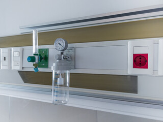Hospital wall unit providing oxygen vacuum for patient care