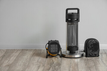 Electric heaters near light wall