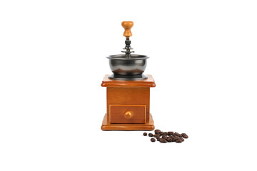 A vintage manual coffee grinder with a wooden base and metal bowl, perfectly isolated on a white background. Scattered coffee beans rest beside the antique device. Cafe promotion and morning concept.