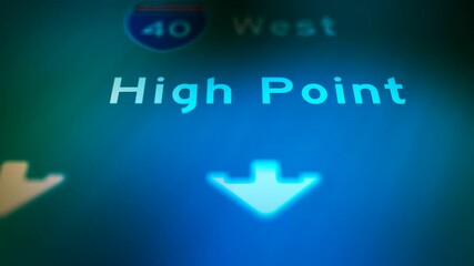 Crime Filler Shot - Cinematic High Point North Carolina Highway Sign at Night