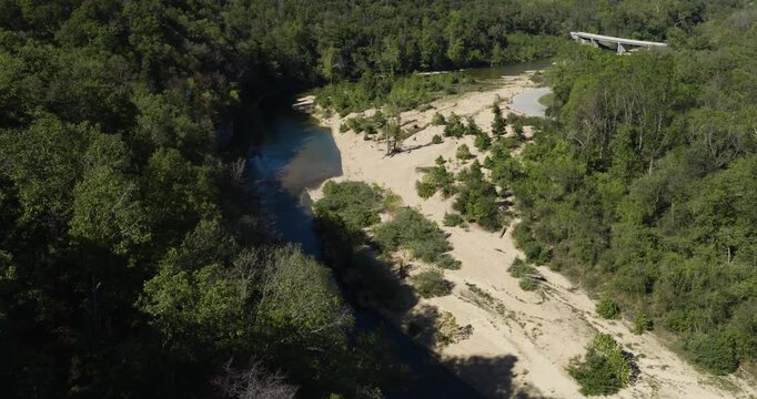 Low-Water Bridge Over The Upper North Fork River Near Devils Backbone Wilderness In Missouri, USA. Aerial Shot