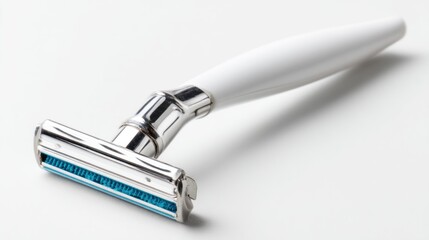 A classic safety razor with a white handle and shiny metal head rests on a white surface