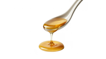 Honey dripping from a silver spoon liquid food isolated on a transparent background