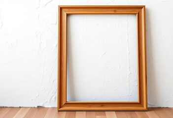 A simple wooden frame leaning against a textured white wall,  decor,  shadow