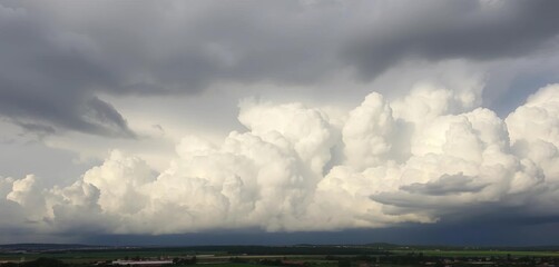 Dense cumulonimbus cloudscape, heavy rain imminent,  dramatic sky,   stratus