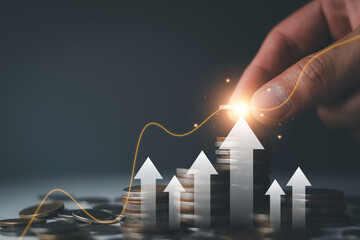Save money for investment concept. Stack of coins with trading chart in financial, stock market, wealth economy, interest rate, Inflation and tax.
