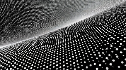 Abstract black and white dotted pattern creates a sense of perspective, emphasizing depth and visual interest through its repetitive geometric design.