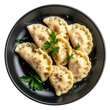 Idrija žlikrofi, traditional Slovenian potato dumplings filled with herbs and served with meat sauce, isolated on a white background.