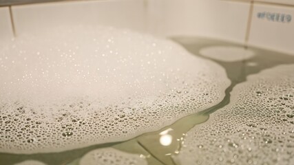 Soothing Bath Bubbles in a Relaxing Water Setting Perfect for Tranquil Evenings