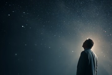 Obraz premium Business executive standing against deep space background with distant stars, calm posture, visionary and future focused leadership concept