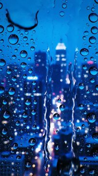 raindrops falling down a window