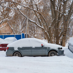 Cars covered with snow in Parking lot