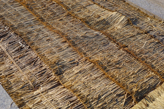 Traditional Korean straw mats keep the soil warm in winter.