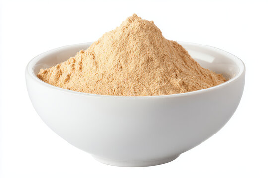 Powdered beige substance in white ceramic bowl isolated on white background, fine texture and natural color for cooking or health use