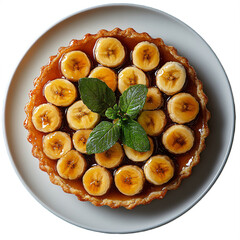 Top view of caramelized banana tart in Michelin star dessert plating isolated on white transparent background