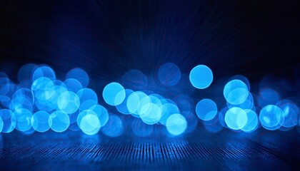 Abstract blue bokeh lights with dark background texture
