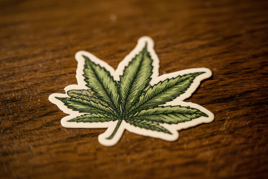 Leaf Cannabis illustration cartoon on floor wood brown. Logo Icon Symbol, mascot merchandise t-shirt, stickers and Label designs, poster, greeting cards advertising business company or brand.