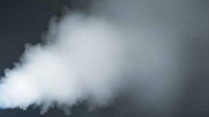 Obraz premium Smoke cloud emission: Captivating swirling smoke emitted, creating a visually compelling display of atmospheric texture and dynamic motion. Witness the subtle dance of a swirling smoke.