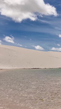 Lencois Maranhenses In Santo Amaro Maranhao Brazil. Unique Landscape Of White Sand Dunes And Crystal-Clear Lagoons. Coast Clouds Sky Seaside Summertime. Coast Outdoor Tropical Environment.