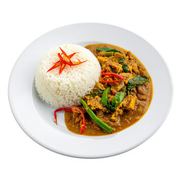 Homemade nasi dagang, featuring perfectly cooked glutinous rice and a savory tuna curry with traditional accompaniments, isolated on white background