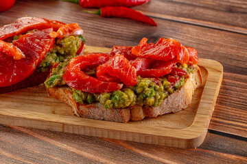 Tapas with salmon and avocado