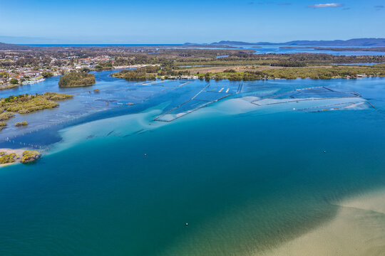 A sweeping aerial view of Wallis Lake and the town of Forster