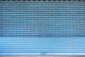 Old and rusty two roll up steel doors pattern background