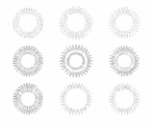 a collection of eight circular designs with radiating lines