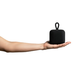 Hand holding a small black portable speaker isolated on transparent background