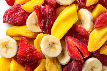 Assortment of Dried Fruits: A colorful medley of sun-dried fruits bursting with vibrant hues and natural sweetness, showcasing the beauty and flavors of nature's bounty.