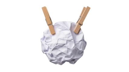 Crumpled white paper with two wooden clothespins isolated on a transparent background