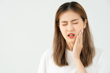 Fototapeta premium Asian woman feel toothache from gingivitis, female suffer tooth, decay problems, dental care. sensitive tooth, decay problem, bad breath, Gingival Recession, Oral Hygiene instruction, tooth extraction