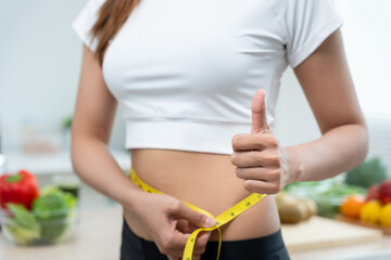 asian women happy results of diet. Beautiful shape. female have a reduced waist size after under...