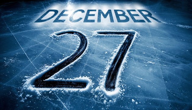 Number scratched into smooth ice with the date December 27 shown clearly on top