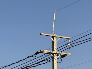 Electric Utility Pole and Power Lines under Blue Sky