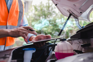 Technician using tablet to analyze electric vehicle system with virtual interface, inspecting battery and engine diagnostics inside car. Concept of EV maintenance and smart technology.