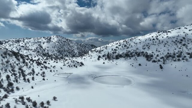 Aerial Birkat Man Snowy Basin Mount Hermon

Drone footage over Birkat Man snowy basin Mount Hermon Israel January 1 2026 winter landscape
