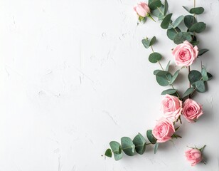 Minimalist Eucalyptus Branches and Pink Roses Flat Lay on White Background with Copy Space