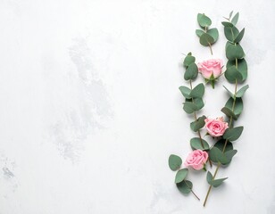 Minimalist Eucalyptus Branches and Pink Roses Flat Lay on White Background with Copy Space