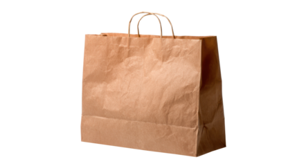 Brown crumpled kraft paper shopping bag with handles standing upright on transparent background, eco friendly, recyclable packaging for grocery, retail, takeout and daily shopping