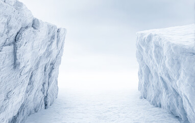 Snowy cliffs separate ice plains with a pale sky during midday, showing the stark beauty of a winter landscape in an arctic region