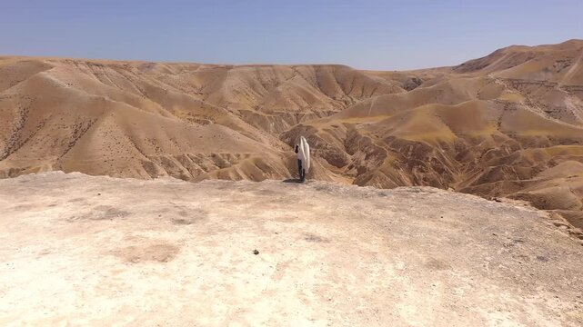 Aerial Jewish Man Praying Wearing Tallit Judean Desert

Drone footage shows Jewish man praying with tallit overlooking Judean Desert Israel 3 January 2026
