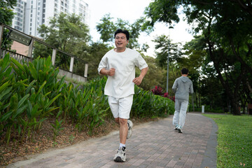 Asia man run in the park