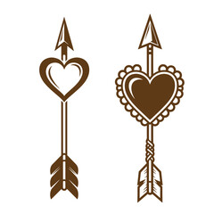 Vintage two brown heart shaped arrows with feathers on white background
