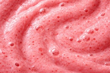 Berry Bliss: A close-up view of a frothy, vibrant berry beverage. Its texture offers a sensory delight, evoking a sense of fresh, natural flavors.
