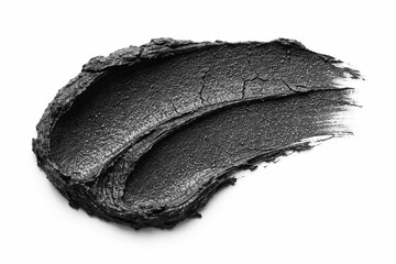 Black Charcoal Swatch: A striking black charcoal swatch, elegantly smeared across the surface, showcasing its texture and hue. Capturing the essence of pure, potent ingredients for skincare