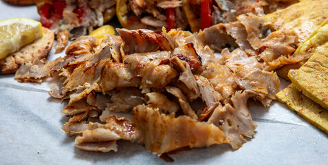 Gyro sliced meat closeup, doner shawarma wraps, traditional greek street food