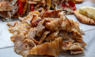 Gyro sliced meat closeup, doner shawarma wraps, traditional greek street food
