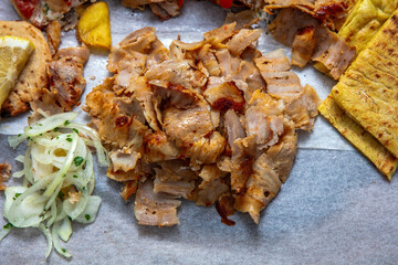 Gyro sliced meat closeup, doner shawarma wraps, traditional greek street food