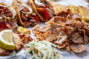 Gyro sliced meat closeup, doner shawarma wraps, traditional greek street food